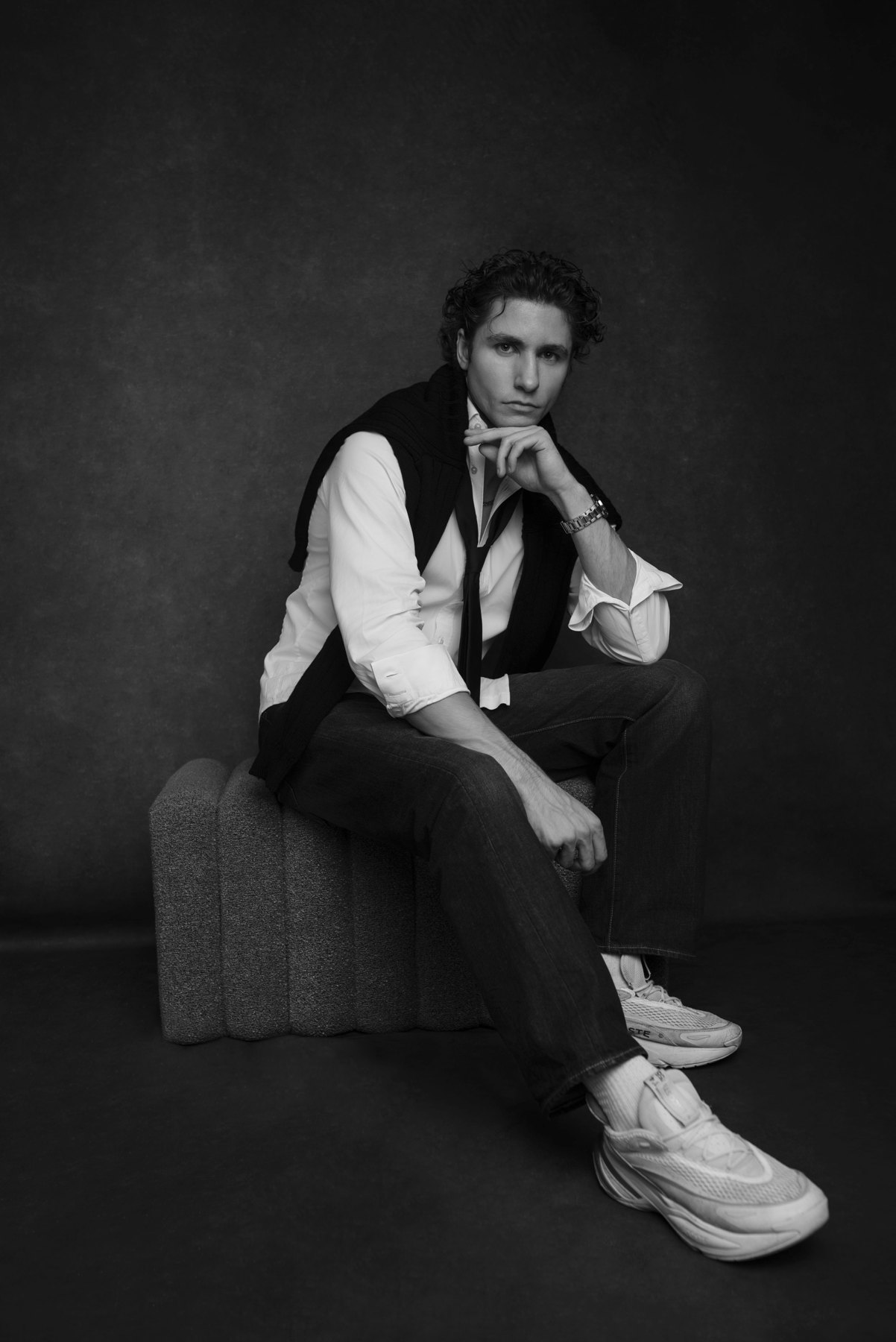 Simon Miotk, seated, black and white studio portrait